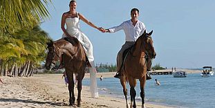 Horse Riding On The Beach